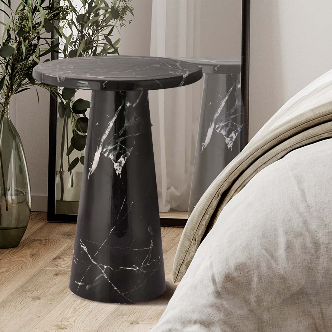 Load video: video of a black marbel table, featured as a bedside accent table.